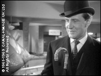 [Steed] leers at the bare breasts of a mannequin she is dressing??